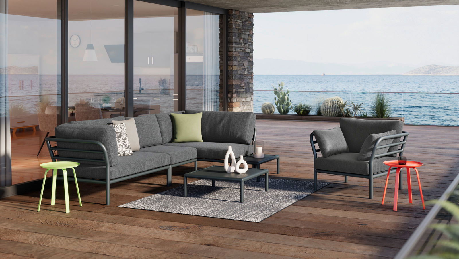 Ambia Garden Beistelltisch KATI Moderner Beistelltisch auf einer Terrasse mit Meerblick, umgeben von stilvollen Gartenmöbeln. Perspektive von vorne.