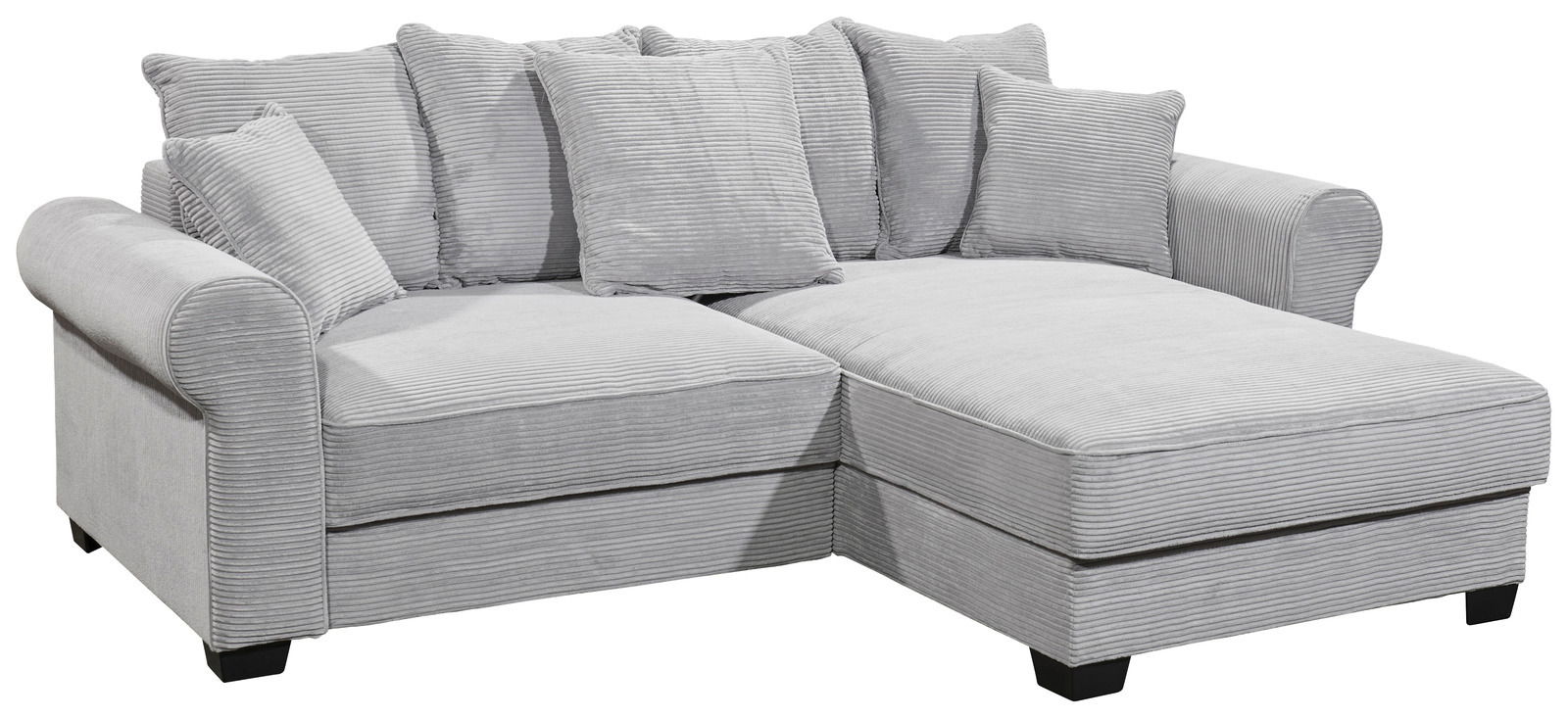 Graues Ecksofa mit mehreren Kissen, aus einer leicht erhöhten Perspektive fotografiert.