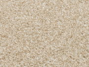 Nahaufnahme eines beigen Uni-Teppichs mit weicher, flauschiger Textur.