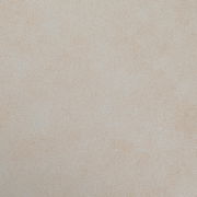 Nahaufnahme einer beigen Textur, möglicherweise Stoff oder Polsterung, von oben betrachtet.