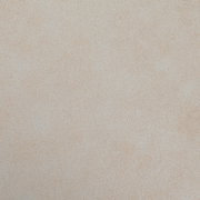 Nahaufnahme einer beigen Textur, möglicherweise Stoff oder Polsterung, von oben betrachtet.