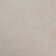 Nahaufnahme einer beigen Textur, möglicherweise Stoff oder Polsterung, von oben betrachtet.