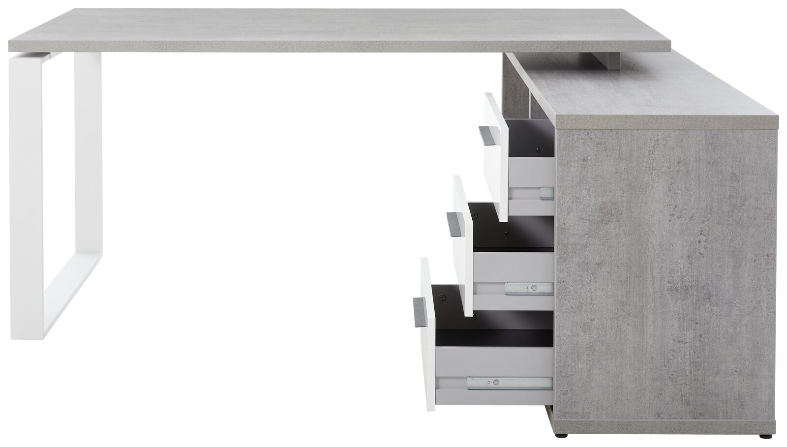 Moderner Eckschreibtisch in Betonoptik mit weißen Metallbeinen und mehreren offenen Schubladen, seitliche Perspektive.