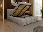 Polsterbettgestell in modernem Design mit hochgeklappter Matratzenauflage, seitliche Perspektive im stilvoll eingerichteten Schlafzimmer.