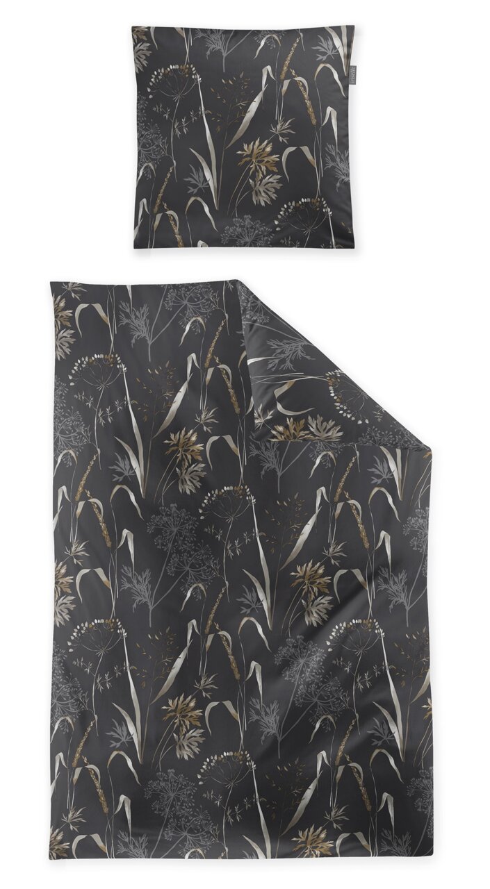 Bettwäsche-Set mit floralem Muster in dunklen Tönen, bestehend aus einem Kissenbezug und einem Bettdeckenbezug, aus der Vogelperspektive fotografiert.