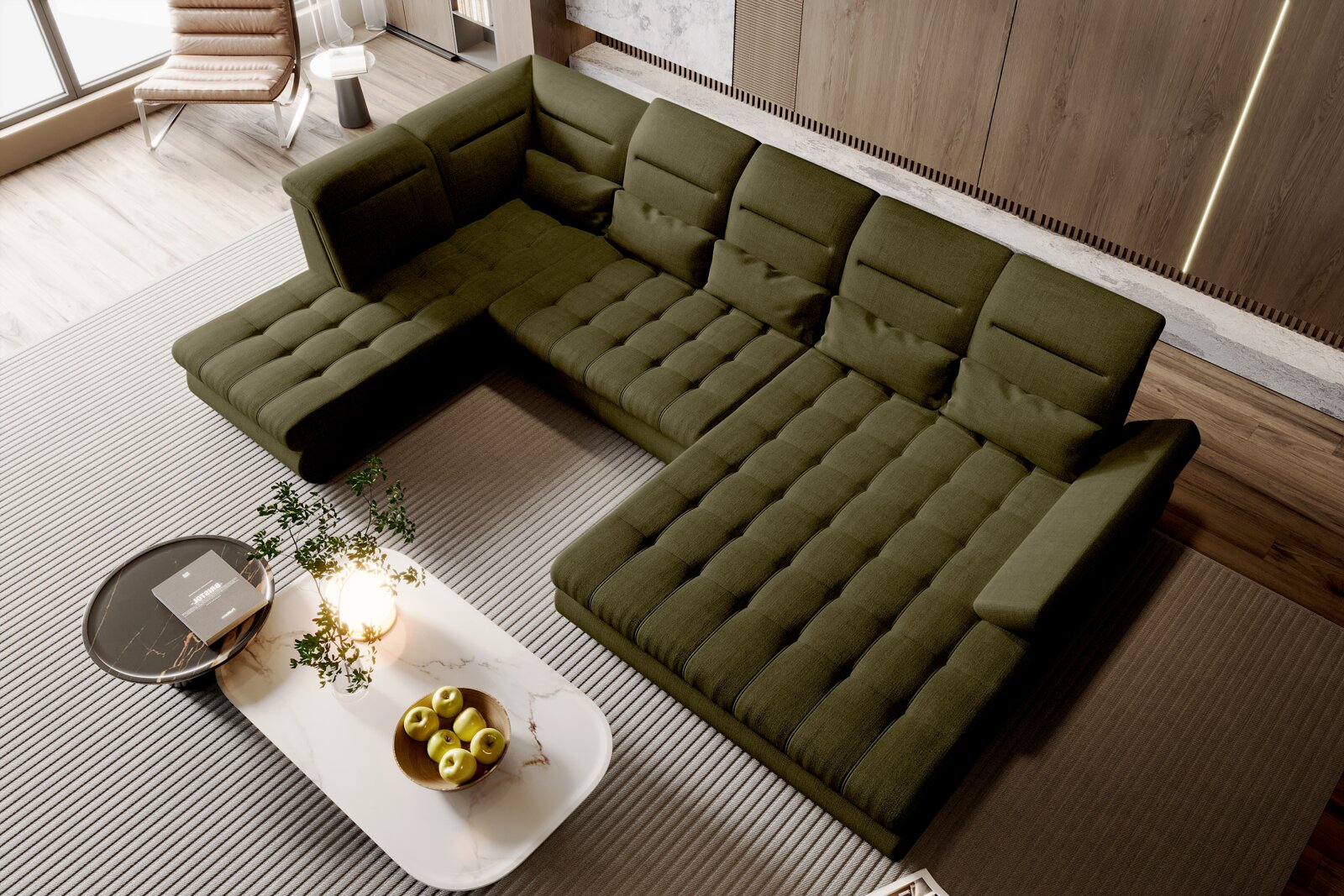 Olivegrünes, modernes U-förmiges Wohnlandschaft-Ecksofa mit gesteppter Sitzfläche und verstellbaren Kopfstützen im Wohnzimmer, Draufsicht aus leicht schräger Vogelperspektive