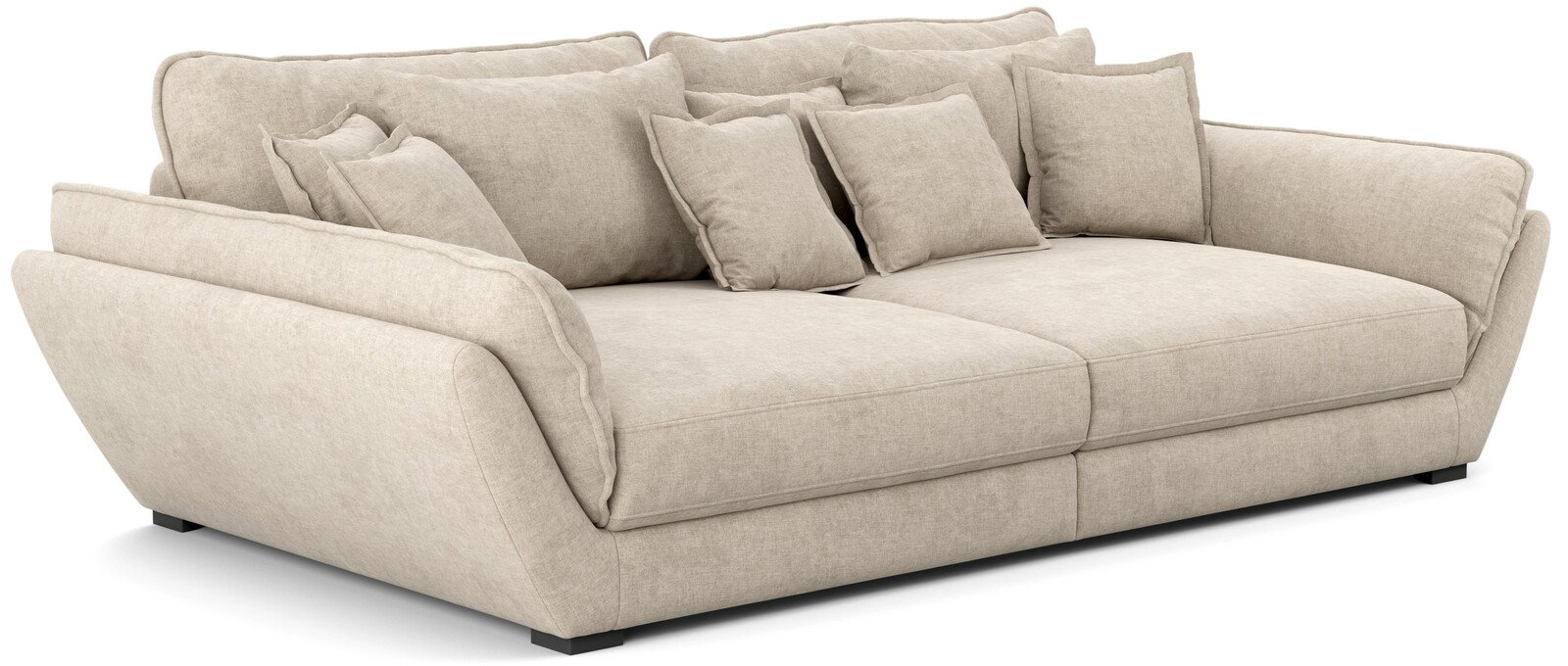 Beiges Big-Sofa mit mehreren Kissen, seitliche Perspektive