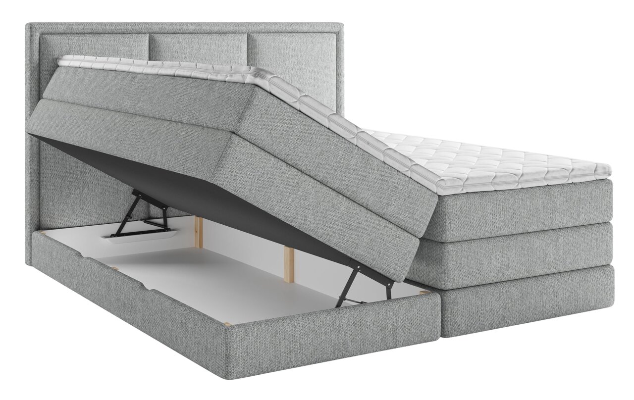 Boxspringbett mit geöffnetem Stauraum, seitliche Perspektive