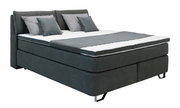 Boxspringbett 180x200 H3/H3 in dunklem Stoff mit mehreren Kissen, seitliche Perspektive