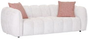 Beiges Sofa mit zwei rosa Kissen, seitliche Perspektive