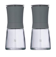 Zwei graue Mühlen aus Glas und Metall, frontal fotografiert, mit modernem Design.