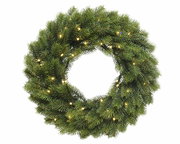 Grüner Weihnachtskranz mit integrierten Lichtern, von vorne betrachtet.