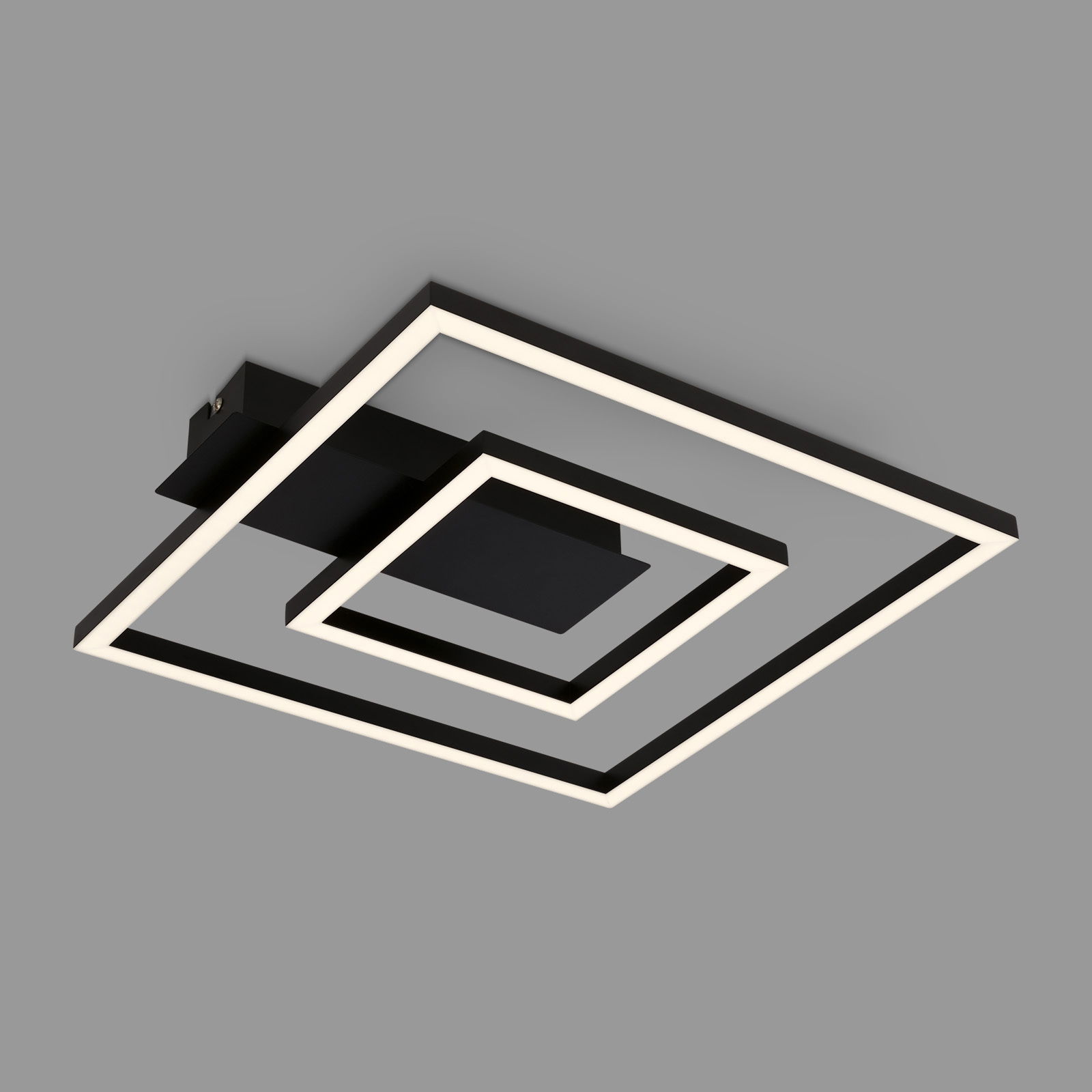 Moderne LED Deckenleuchte in Schwarz mit geometrischem Design, seitliche Perspektive