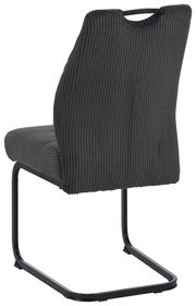 Rückansicht eines modernen Schwingstuhls mit schwarzem, geripptem Stoffbezug und schwarzem Metallgestell.