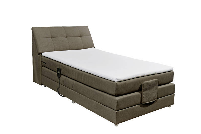 Boxspringbett in seitlicher Perspektive mit verstellbarem Kopfteil und Fernbedienung
