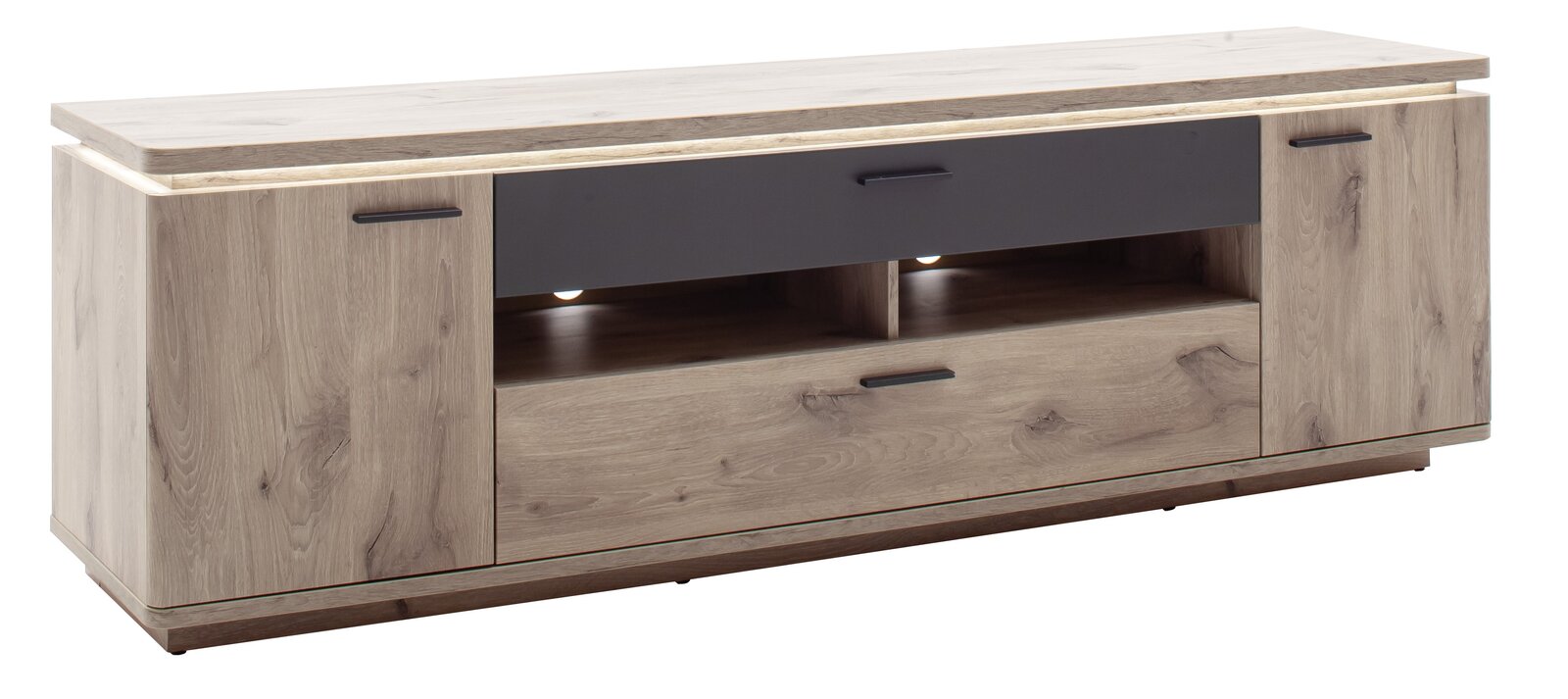 Modernes TV-Lowboard in heller Holzoptik mit schwarzen Fronten, zwei Seitentüren, Schublade und offenen Fächern mit LED-Beleuchtung, freigestellt auf weißem Hintergrund, Perspektive: frontale Ansicht leicht von links.