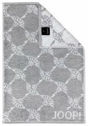 Graues Gästetuch mit geometrischem Muster und JOOP!-Logo, von oben fotografiert.