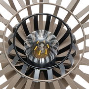 Nahaufnahme einer Tischleuchte von oben, die das Design mit konzentrischen Kreisen und einer zentralen Glühbirne zeigt.