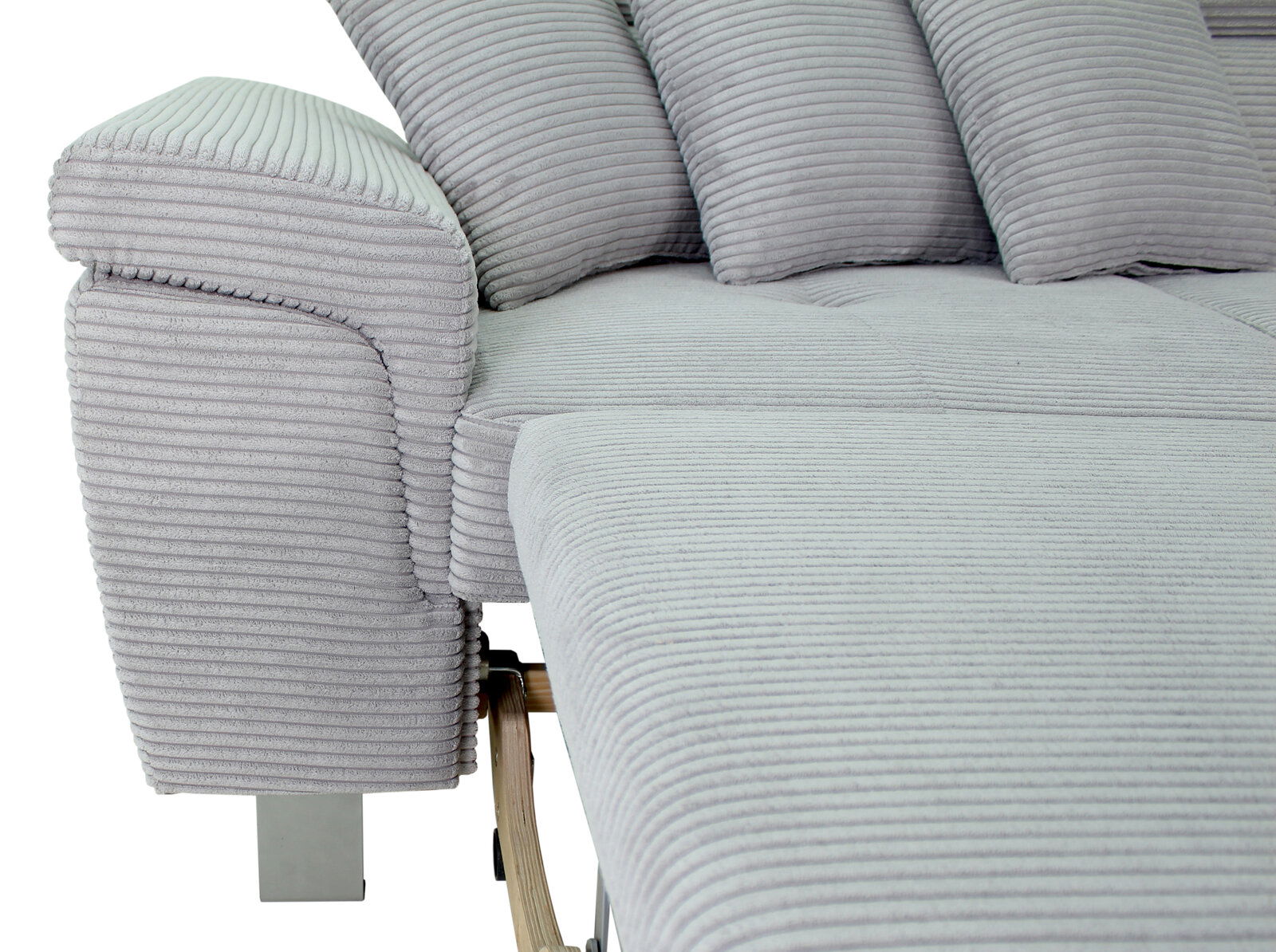 Nahaufnahme einer grauen, gerippten Rundecke mit mehreren Kissen, seitliche Perspektive