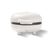 Weißes Waffeleisen in geschlossener Position, frontal betrachtet.