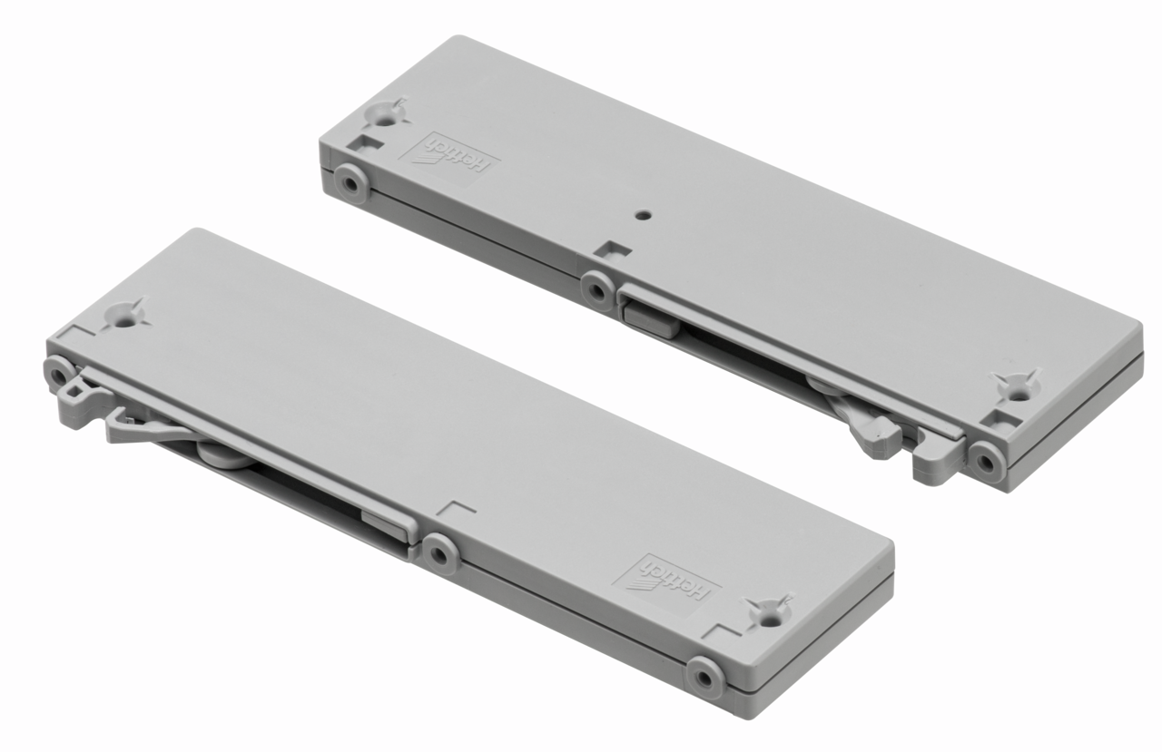 Zwei graue Schließdämpfer in rechteckiger Form, von oben betrachtet.