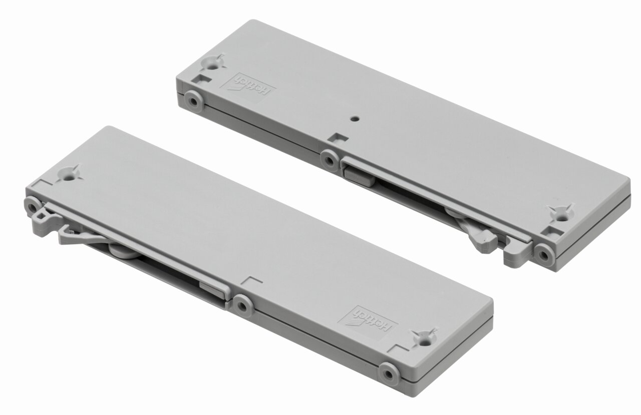 Zwei graue Schließdämpfer in rechteckiger Form, von oben betrachtet.