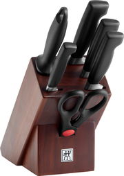 Messerblock aus Walnussholz mit mehreren schwarzen Messern und einer Schere, seitliche Perspektive