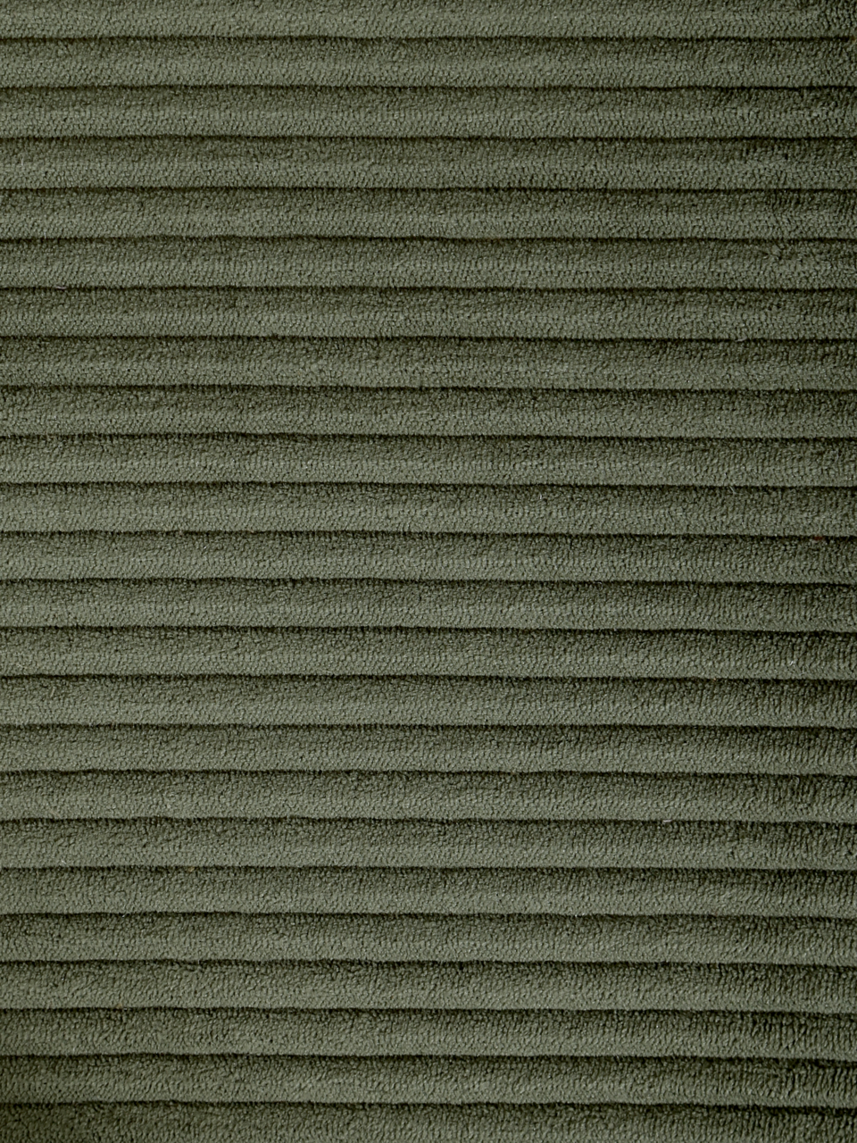 Z2 Schwingstuhl ARNE Nahaufnahme eines grünen, gerippten Stoffes, der für einen Schwingstuhl verwendet wird.