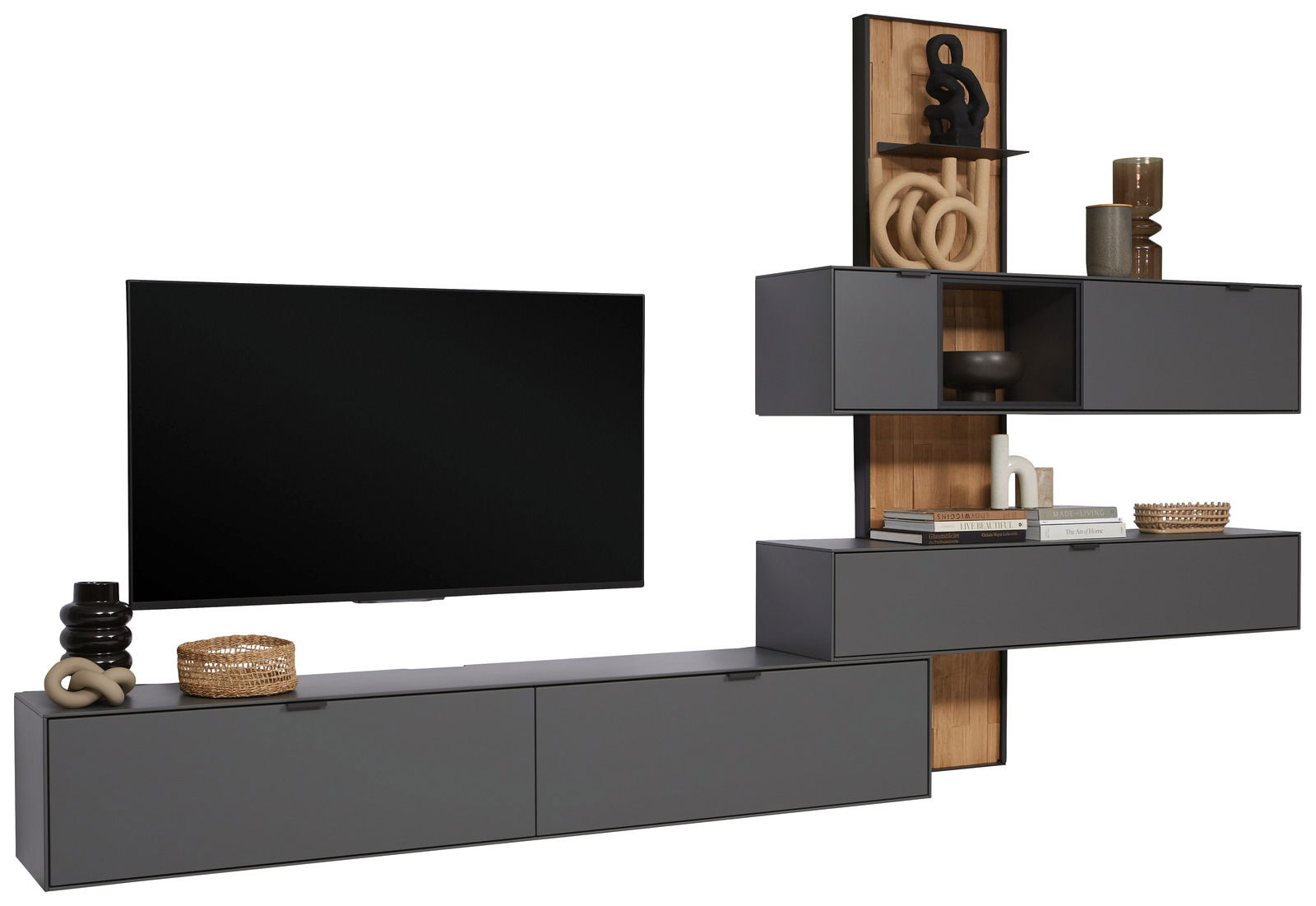 Dieter Knoll Wandkombination RINA Moderne Wandkombination in dunklem Grau mit mehreren Schränken und Regalen, dekoriert mit Büchern und Accessoires. Perspektive von vorne.