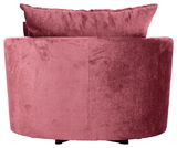 Rückansicht eines rosafarbenen Sessels mit weichem Stoffbezug und Kissen.