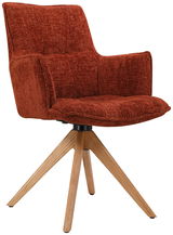 Moderner Sessel in Rostrot mit gepolstertem Sitz und Rückenlehne, auf einem vierbeinigen Holzgestell. Seitenansicht.