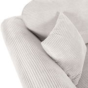 Nahaufnahme eines hellgrauen, gerippten Sofas mit Kissen, Perspektive von oben.