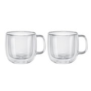 Zwei transparente Cappuccinogläser mit Henkel, seitliche Ansicht