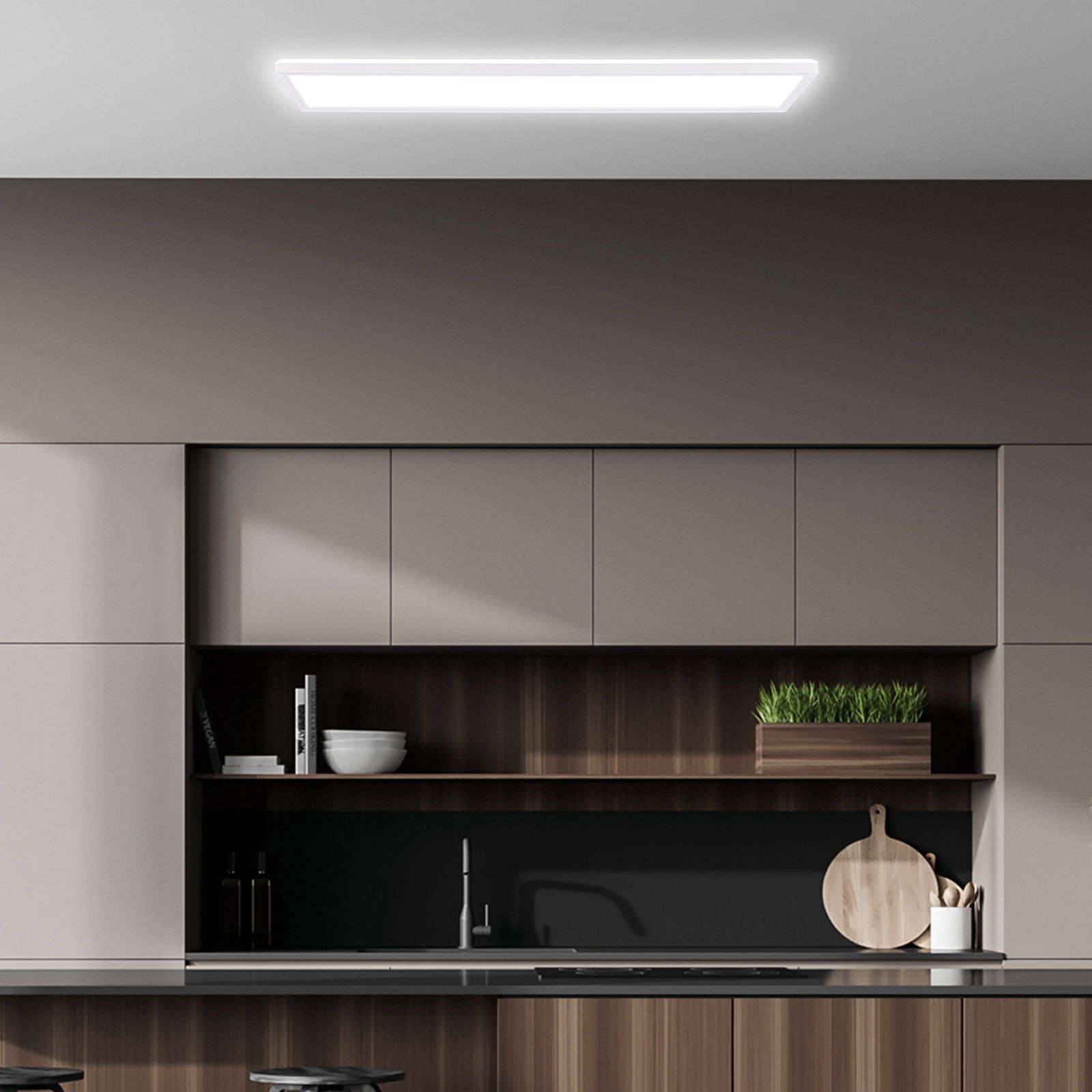 LED-Paneel in moderner Küche von unten betrachtet, eingebaut in die Decke, sorgt für gleichmäßige Beleuchtung.