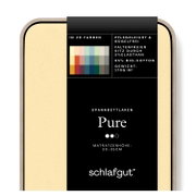 Verpakking van een hoeslaken in de kleur beige, met informatie over het materiaal en het onderhoud op de voorkant. Aanzicht van bovenaf.