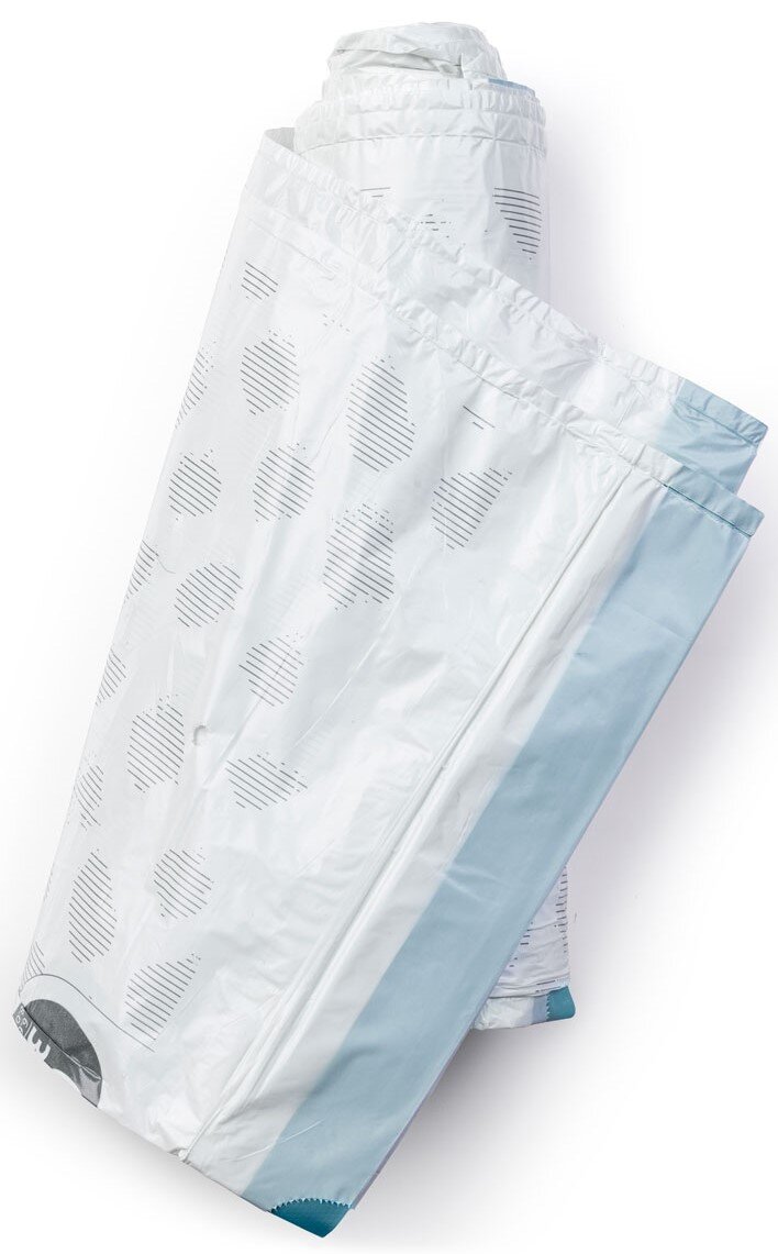 Rolle von weißen Müllbeuteln mit blauen Akzenten, aus der Vogelperspektive fotografiert.