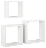 Dreiteiliges Wandregal-Set in Weiß, bestehend aus quadratischen und rechteckigen Regalen, frontal abgebildet.