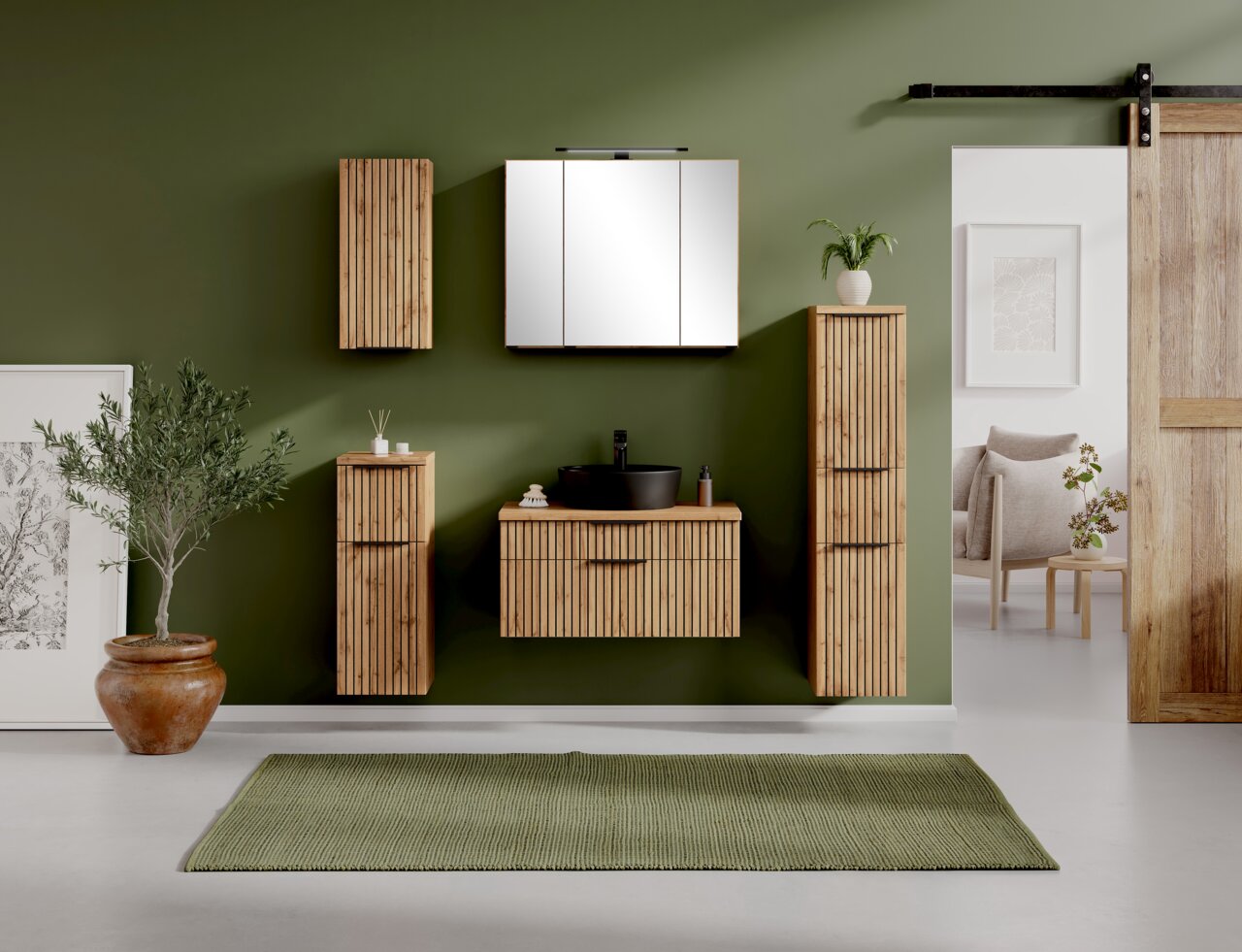 Modernes Waschtisch-Set 80 cm in einem stilvollen Badezimmer mit grüner Wand, Holzschränken und schwarzem Waschbecken, aus frontaler Perspektive betrachtet.