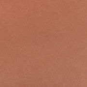 Nahaufnahme einer orangefarbenen Stoffstruktur, verwendet für einen Stuhl.