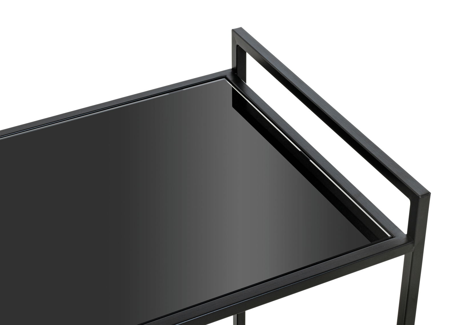 Nahaufnahme eines modernen schwarzen Beistellwagens mit Glasoberfläche, von oben betrachtet.