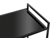 Nahaufnahme eines modernen schwarzen Beistellwagens mit Glasoberfläche, von oben betrachtet.