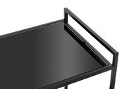 Nahaufnahme eines modernen schwarzen Beistellwagens mit Glasoberfläche, von oben betrachtet.