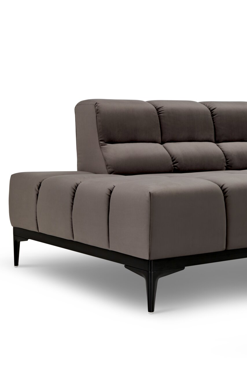 Grijze longchair-bank met gestoffeerde kussens en zwarte poten, zijaanzicht