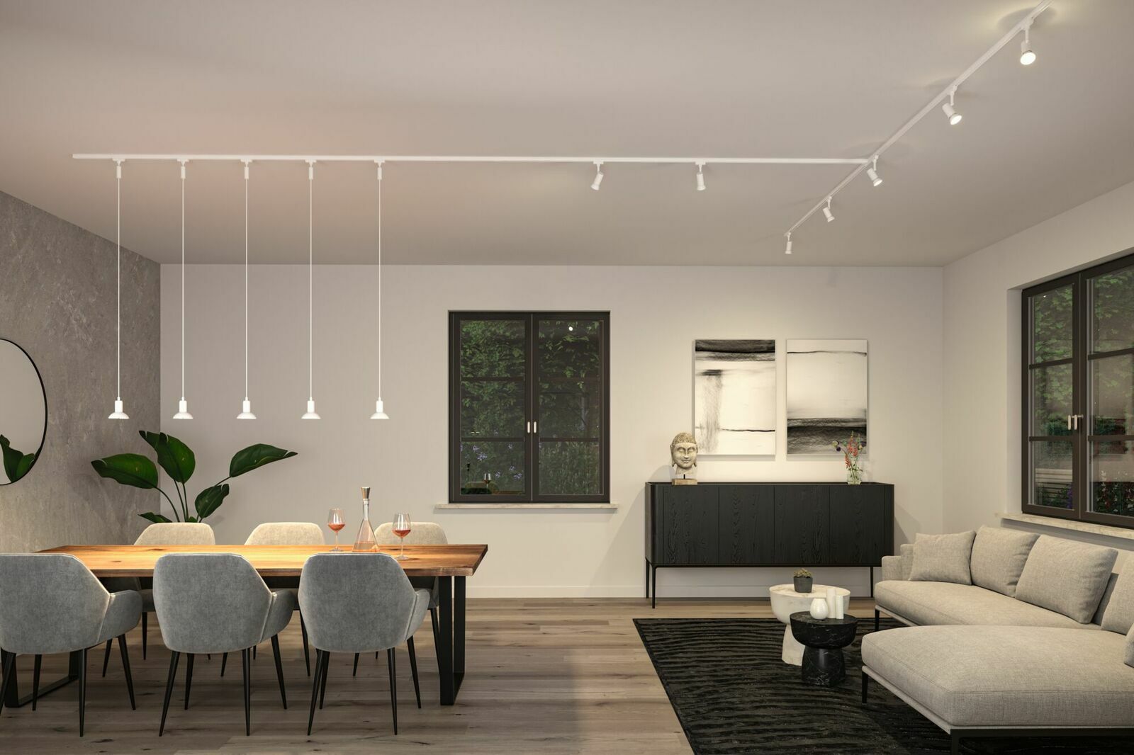 Moderne Schienenpendelleuchte Runa in einem stilvollen Wohnzimmer, seitliche Perspektive.