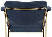 Rückansicht eines Armlehnenstuhls mit blauem Stoffbezug und goldfarbenem Metallrahmen.