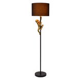 Stehlampe mit schwarzem Schirm und Affenfigur, seitliche Perspektive