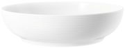 Weiße Schüssel mit geriffelter Oberfläche, seitliche Perspektive