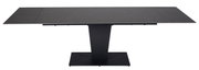 Moderne eettafel met donker tafelblad en centrale poot, gezien van voren.