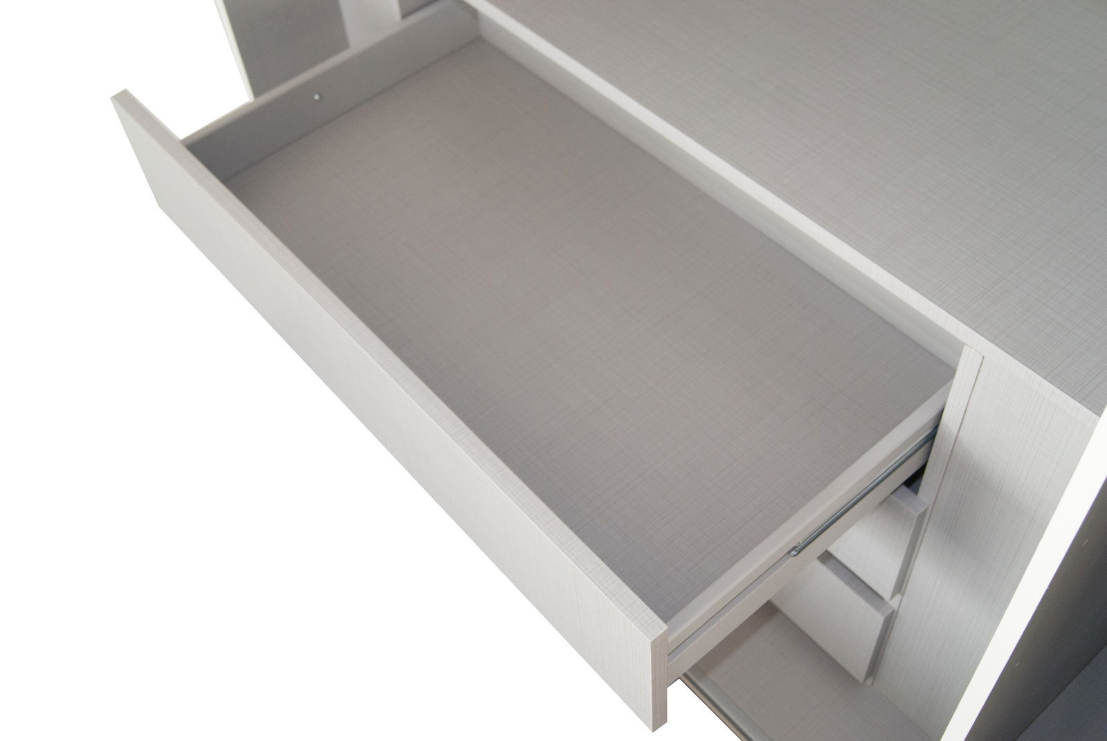 Offene Schublade von oben betrachtet, zeigt einen Schubkasteneinsatz in modernem Design.