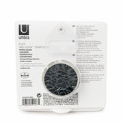 Rückansicht der FLEX GEL-LOCK Seifenschale in Weiß, verpackt auf einer Kartonrückseite mit Produktinformationen.